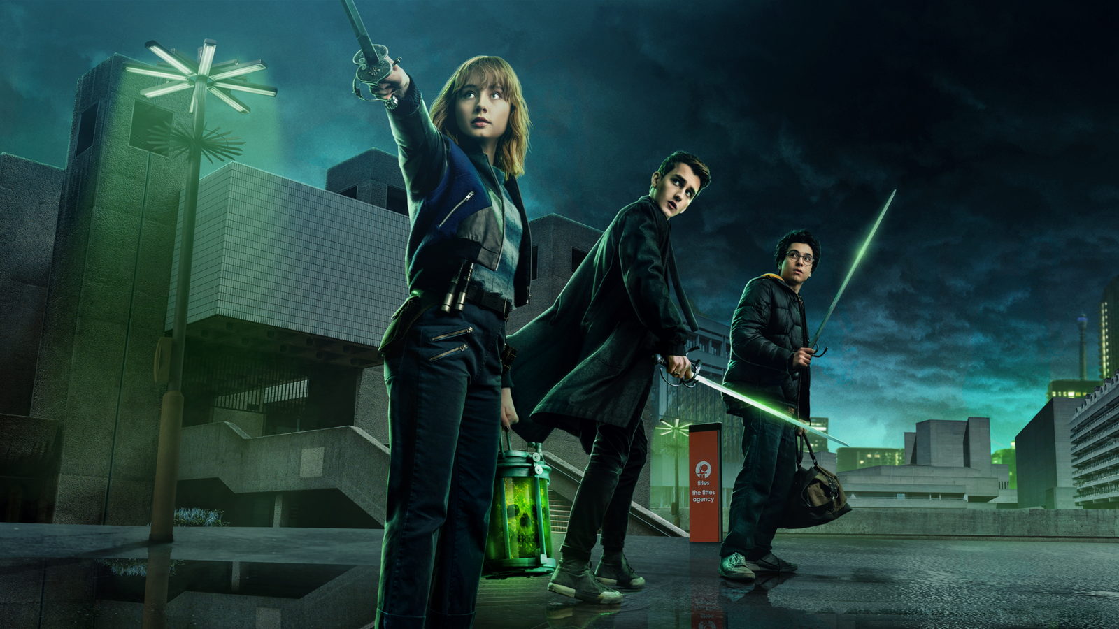 Lucy Carlyle, Anthony Lockwood and George Karim stand with drawn rapiers on London's South Bank at night, lit by ghost-lamps and the green glow of a spirit jar.